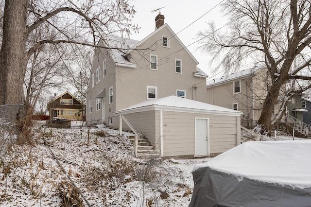 view of snow covered property