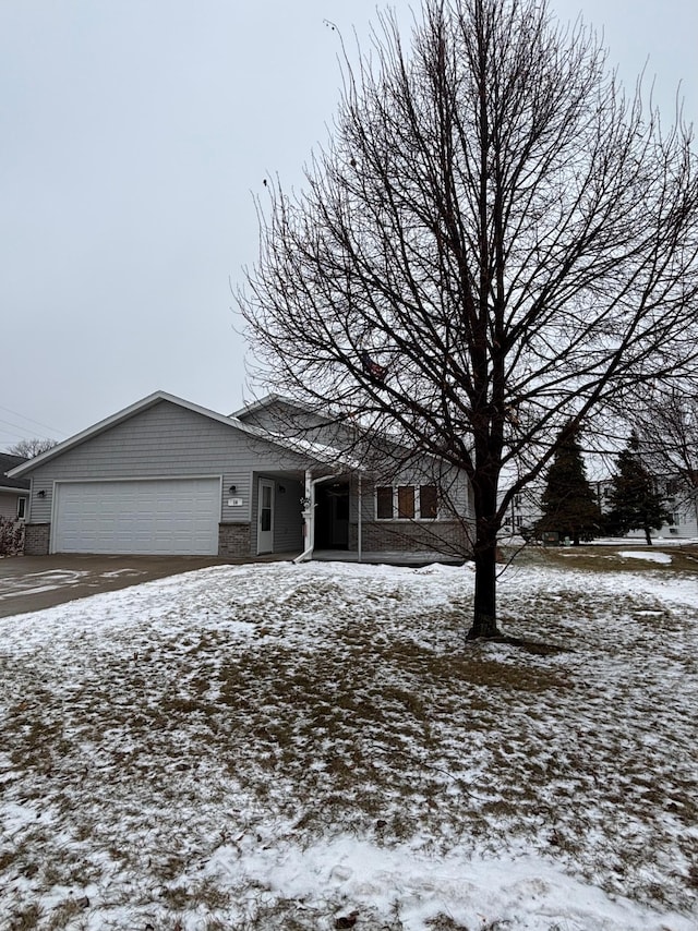 view of front of property featuring a garage