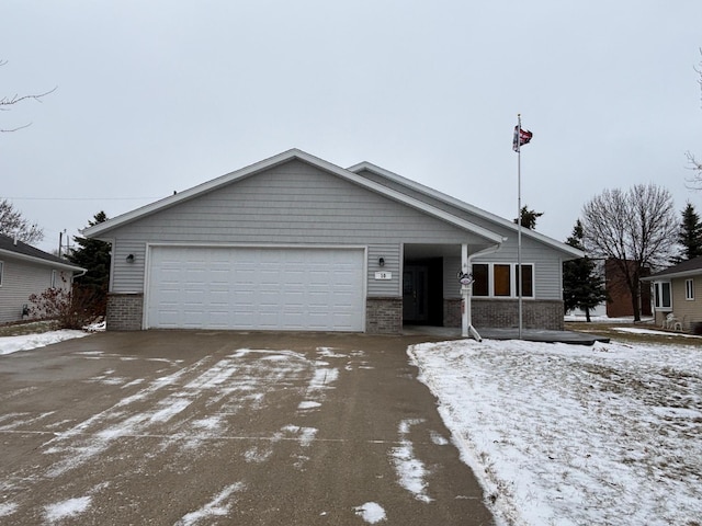 single story home with a garage