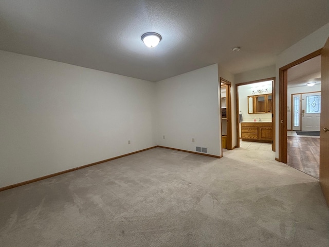 interior space featuring a textured ceiling