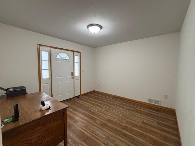 10 Townhouse Rd, Morris, MN 56267 - foyer entrance with dark wood-style flooring and baseboards