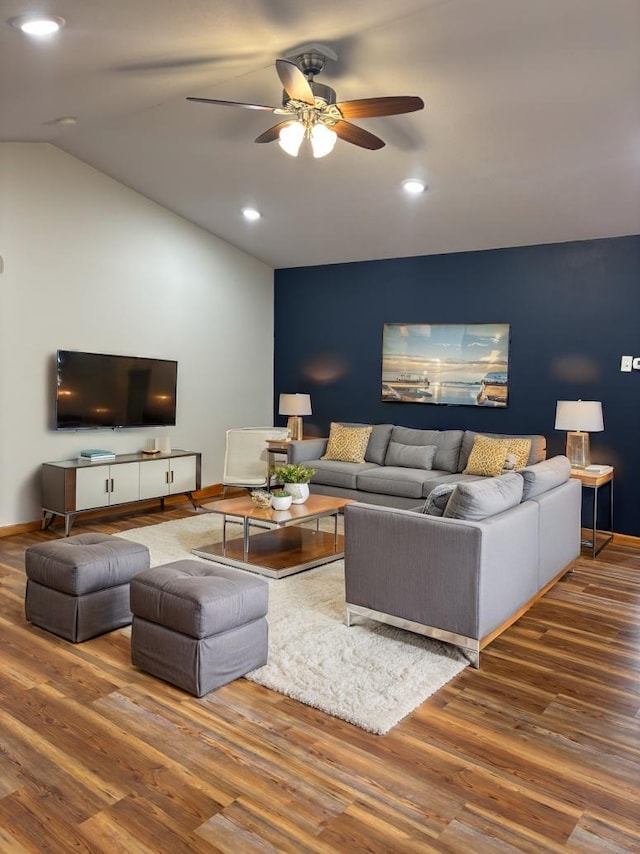 10 Townhouse Rd, Morris, MN 56267 - living room with wood finished floors, a ceiling fan, recessed lighting, baseboards, and vaulted ceiling