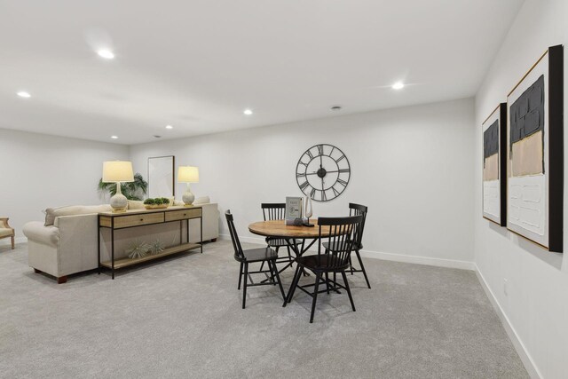 view of carpeted dining space