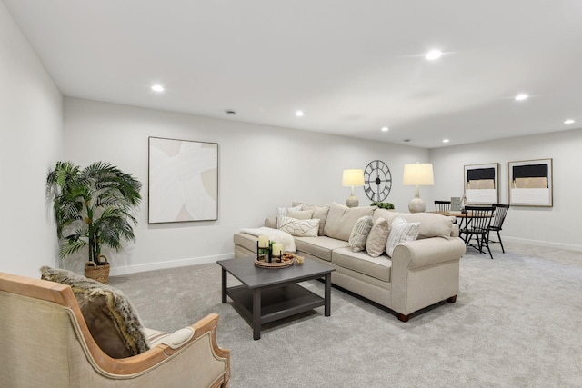 living room featuring light carpet