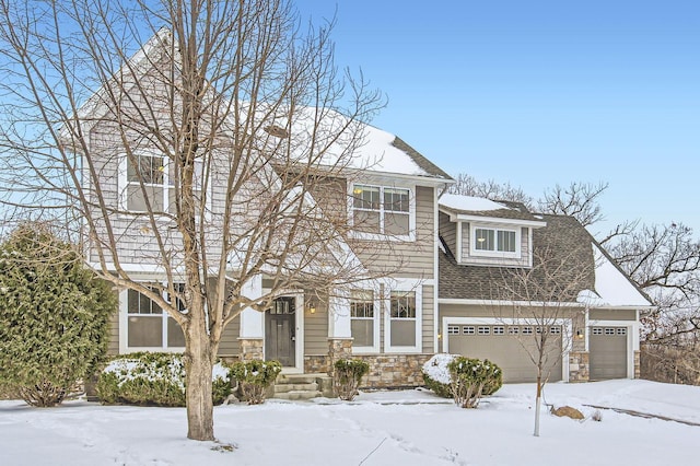 view of front of property with a garage