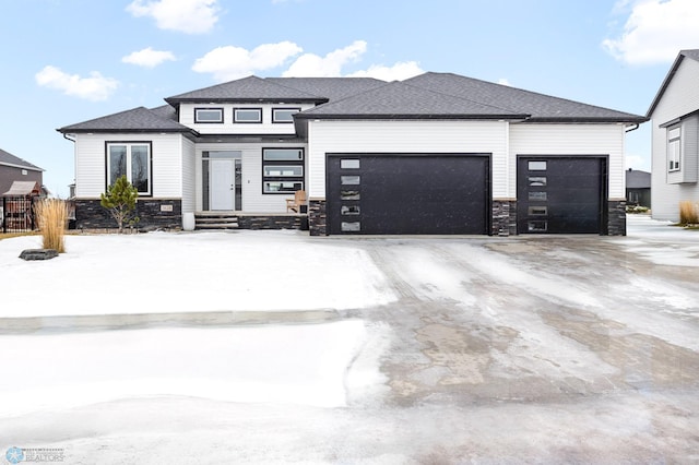 prairie-style home with a garage