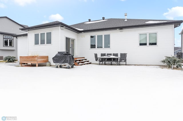 view of snow covered property