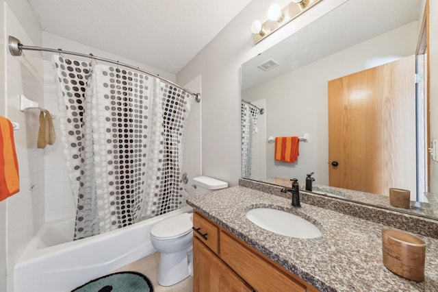 full bathroom featuring vanity, shower / bath combination with curtain, and toilet