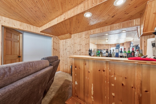 bar with wooden walls, wooden ceiling, and carpet