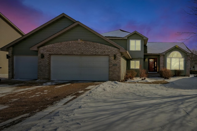 view of front of property featuring a garage