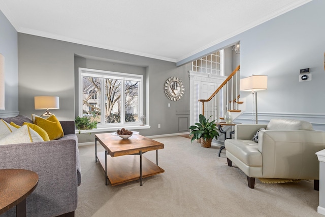 living room with light carpet, ornamental molding, and stairway