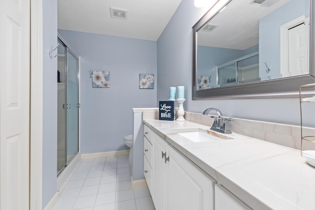 full bathroom with baseboards, visible vents, tile patterned flooring, vanity, and a shower stall