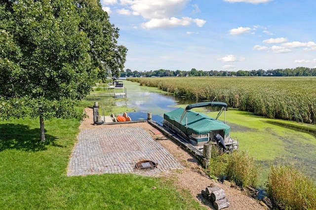 exterior space featuring a water view and a rural view