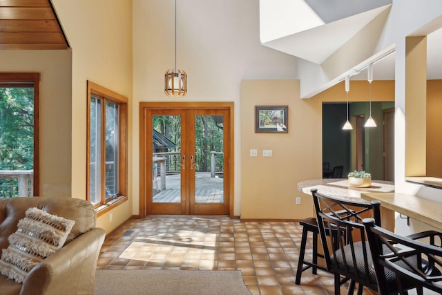 doorway with french doors and plenty of natural light