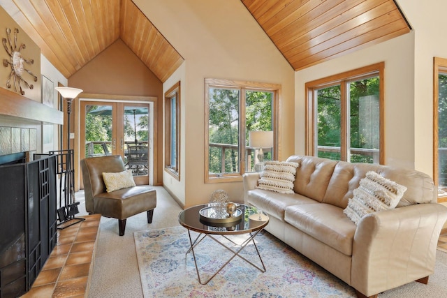 tiled living room featuring wooden ceiling, high vaulted ceiling, and french doors