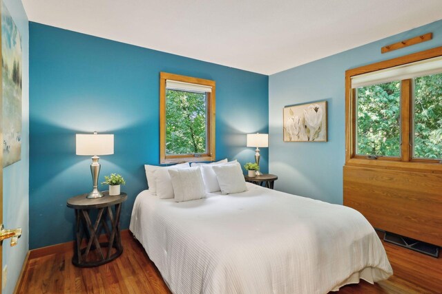 bedroom featuring hardwood / wood-style floors