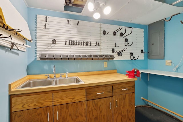 kitchen with electric panel and sink