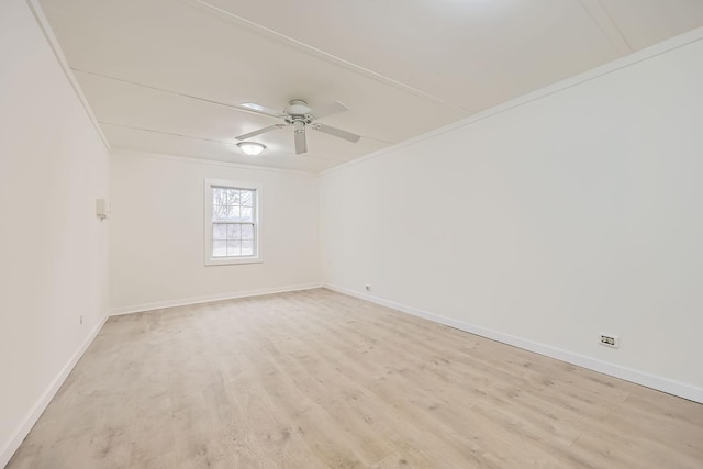 unfurnished room featuring crown molding, light hardwood / wood-style flooring, and ceiling fan