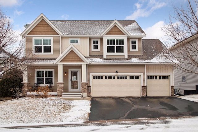 craftsman-style house with a garage