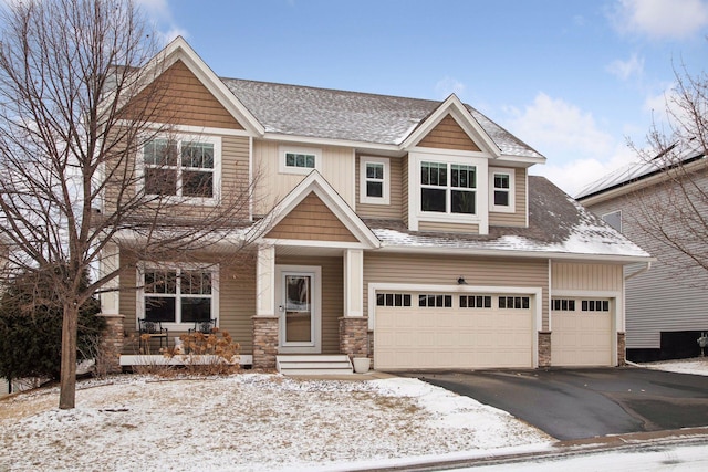 craftsman-style house with a garage