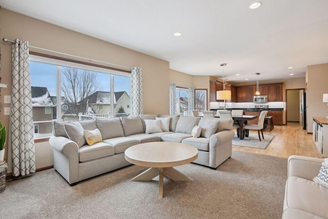 living room with light hardwood / wood-style floors