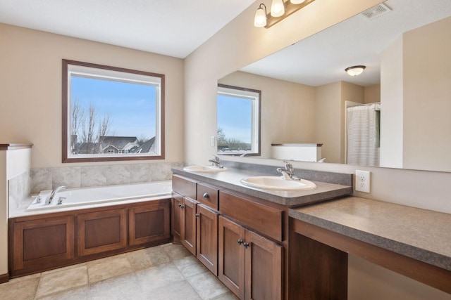 bathroom featuring vanity and a bathtub