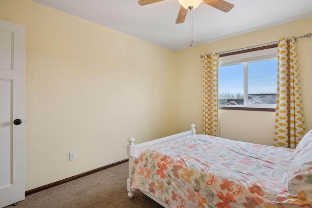 bedroom with ceiling fan and carpet flooring