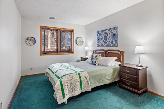 carpeted bedroom with a textured ceiling