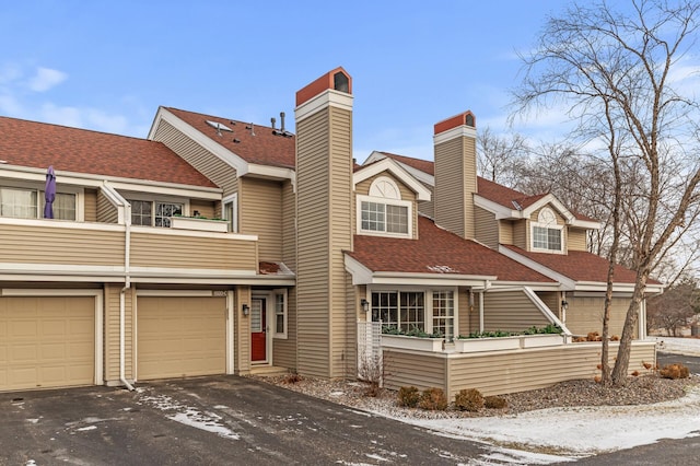 view of front of house featuring a balcony