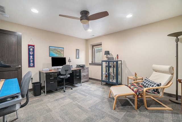 office space with ceiling fan and light colored carpet