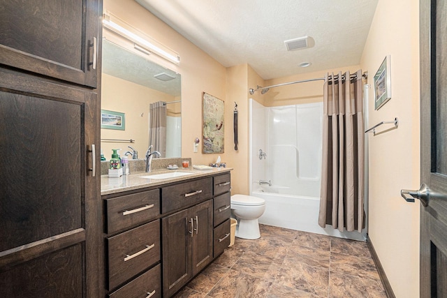 full bathroom featuring shower / bath combination with curtain, toilet, a textured ceiling, and vanity