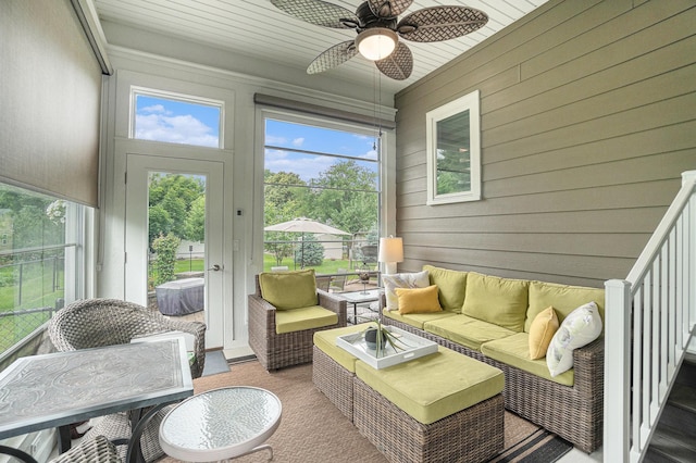 sunroom / solarium with ceiling fan and wood ceiling