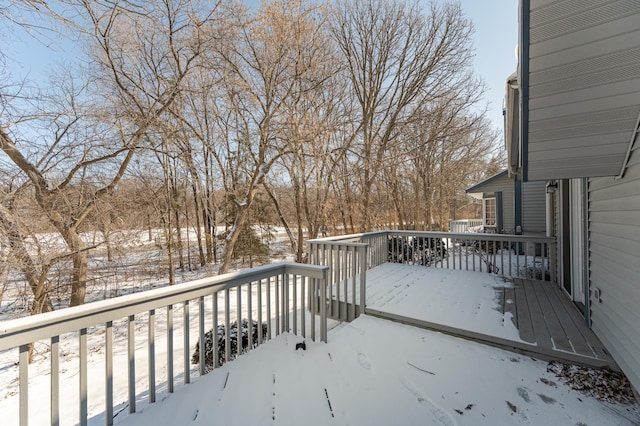 view of snow covered deck