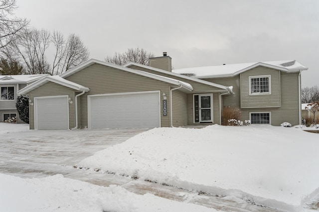 split level home featuring a garage