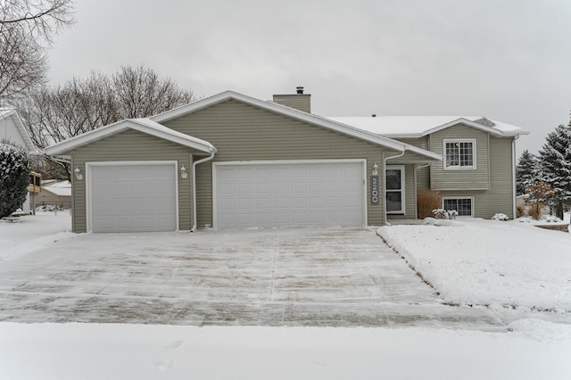 view of front of home with a garage