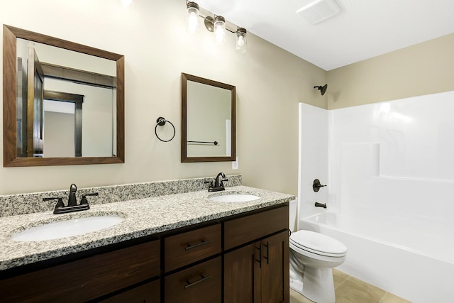 full bathroom with tile patterned floors, vanity, toilet, and tub / shower combination