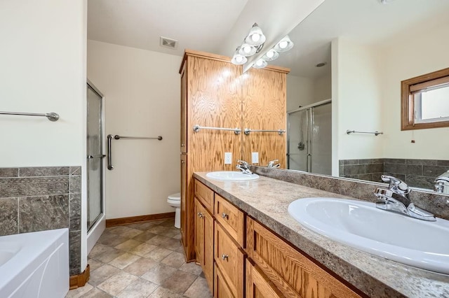 full bathroom with plus walk in shower, vanity, and toilet