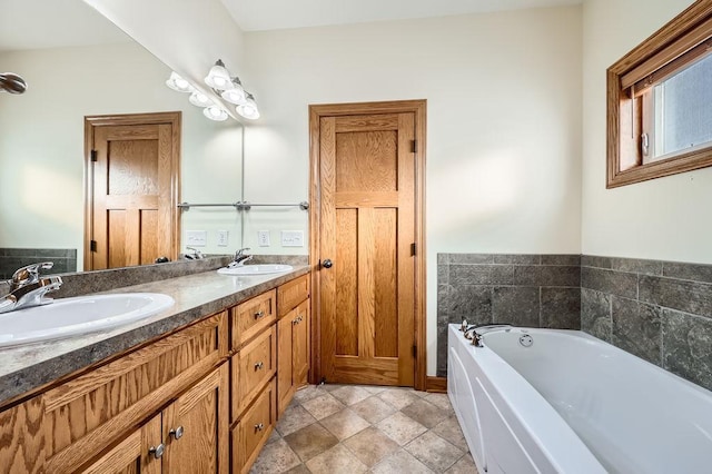 bathroom featuring a bathtub and vanity