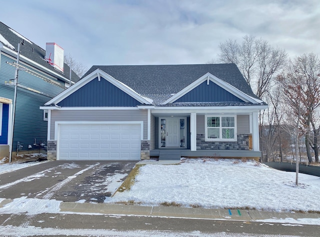 view of front of property with a garage