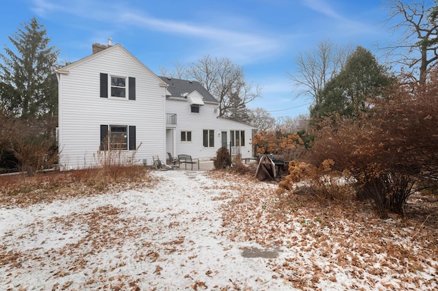 view of snow covered property