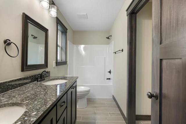 full bathroom featuring vanity, toilet, and shower / bath combination