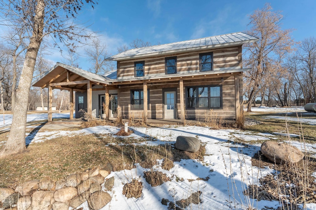 view of log cabin