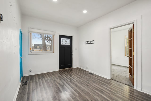 entrance foyer featuring dark hardwood / wood-style flooring