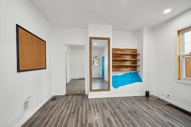 interior space with dark wood-type flooring