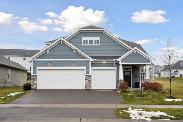 craftsman-style home with a garage