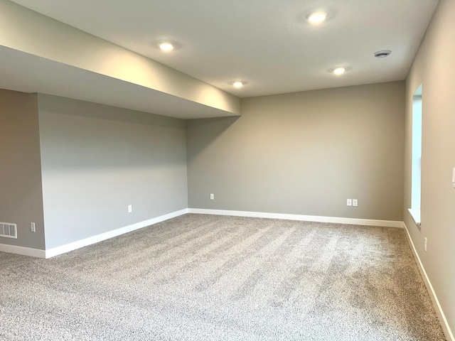 basement with carpet flooring