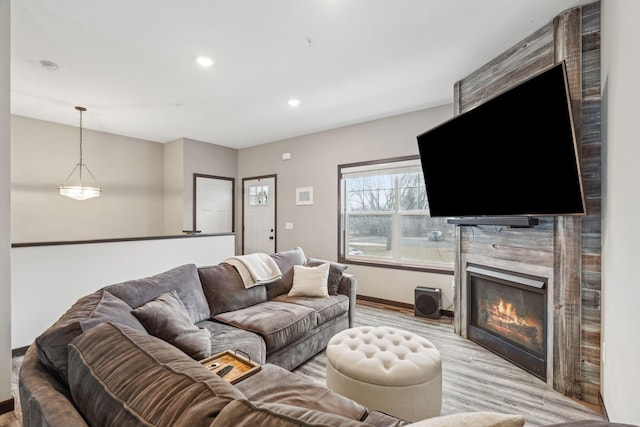 living room with light hardwood / wood-style flooring