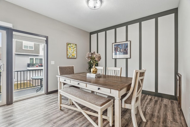 dining room featuring hardwood / wood-style flooring