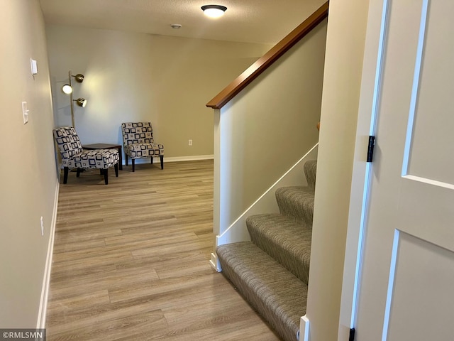 805 Tomahawk Ct, Madison Lake, MN 56063 - stairway with baseboards and wood finished floors