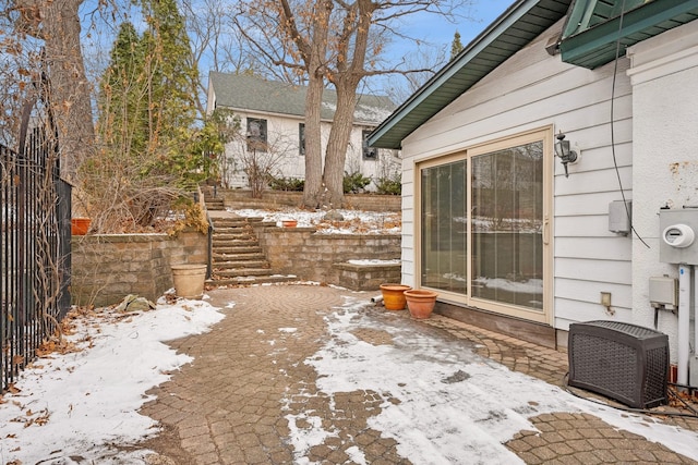 view of snow covered patio